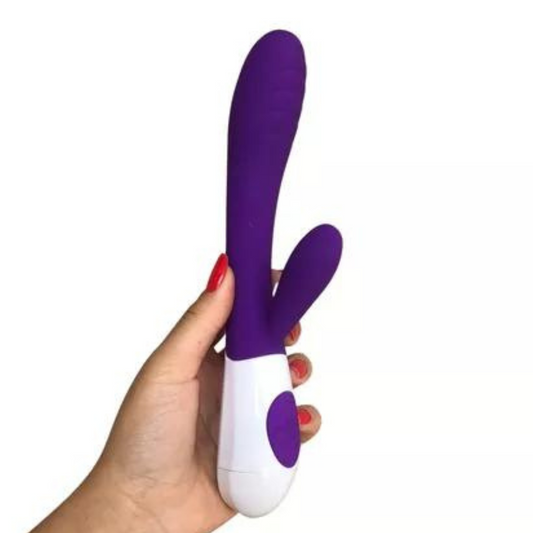 DILDO CON ESTIMULADOR RECARGABLE.